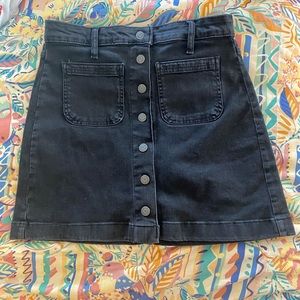 Black denim mini skirt
